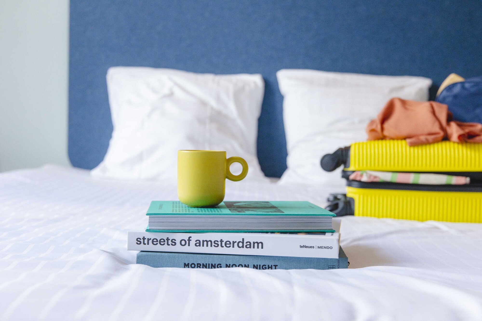 Hotel Casa Amsterdam - Books with drink on hotel room.