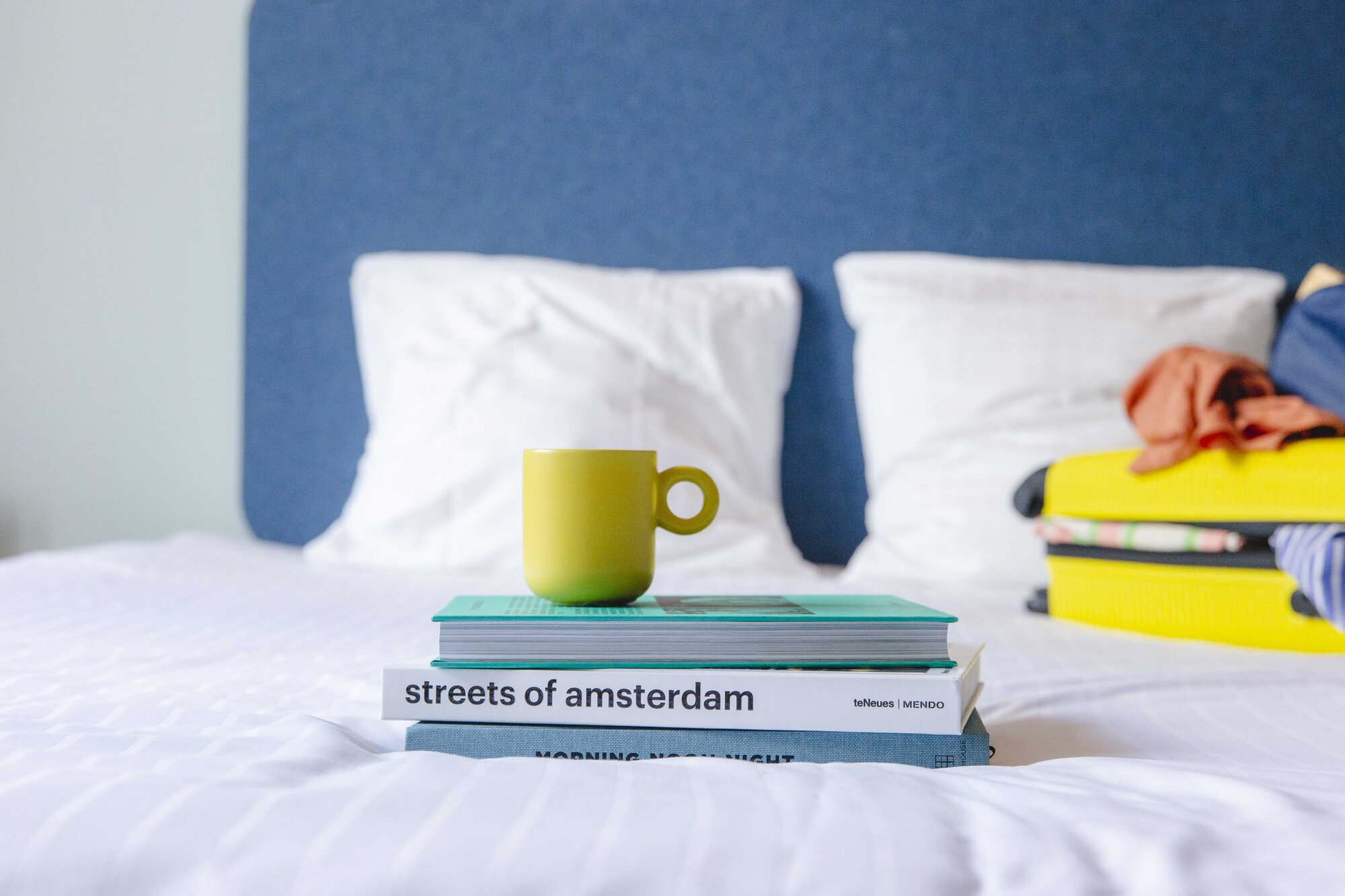 Hotel Casa Amsterdam - Books with drink on hotel room.