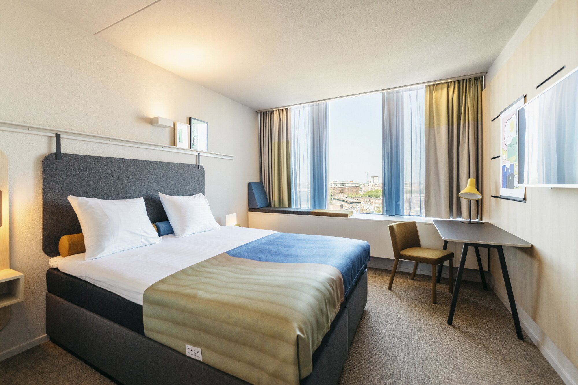 Premium double room in Hotel Casa with a view on Amsterdam.